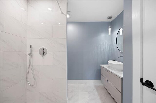 bathroom with vanity, toilet, and curtained shower