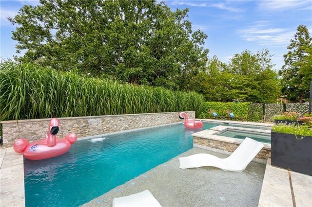 view of patio / terrace with an outdoor living space with a fire pit