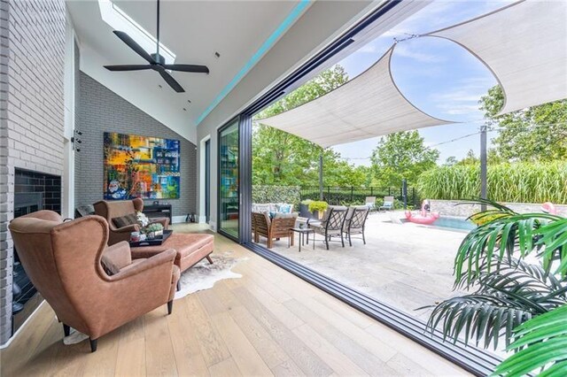 view of patio / terrace with an outdoor living space and ceiling fan