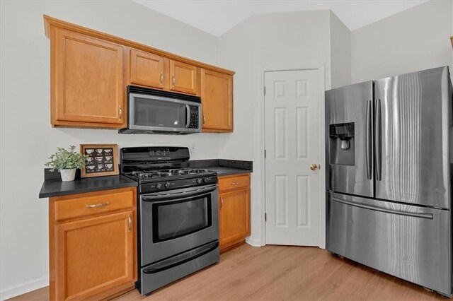 1795 Waterside Dr NW, Kennesaw, GA 30152 - kitchen featuring appliances with stainless steel finishes and light hardwood / wood-style flooring