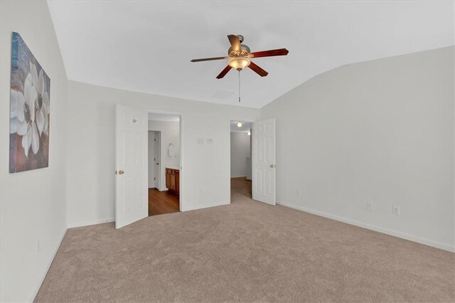 1795 Waterside Dr NW, Kennesaw, GA 30152 - unfurnished bedroom with vaulted ceiling, carpet floors, ensuite bathroom, and ceiling fan