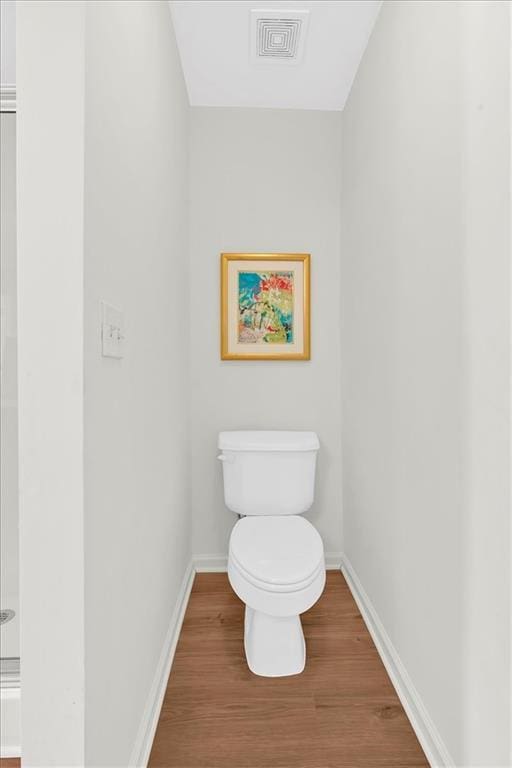 1795 Waterside Dr NW, Kennesaw, GA 30152 - bathroom with hardwood / wood-style floors and toilet