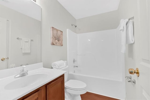 1795 Waterside Dr NW, Kennesaw, GA 30152 - full bathroom featuring shower / bathtub combination, vanity, toilet, and wood-type flooring