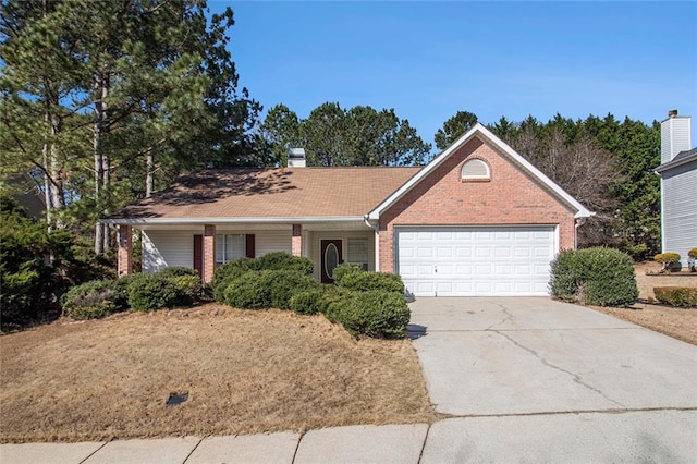 ranch-style home with driveway, brick siding, a chimney, and an attached garage