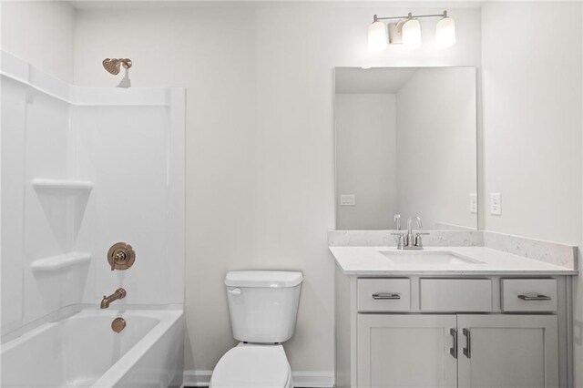 full bathroom with toilet, vanity, and shower / bathing tub combination