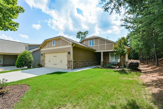 view of front of home featuring a front lawn and a garage