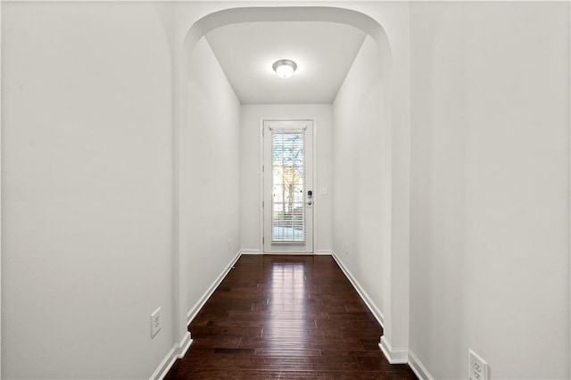 doorway to outside with dark hardwood / wood-style floors