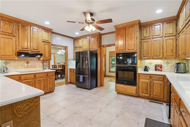 169 Robson Trl, Mcdonough, GA 30252 - kitchen featuring black appliances, tasteful backsplash, ceiling fan, brown cabinets, and recessed lighting