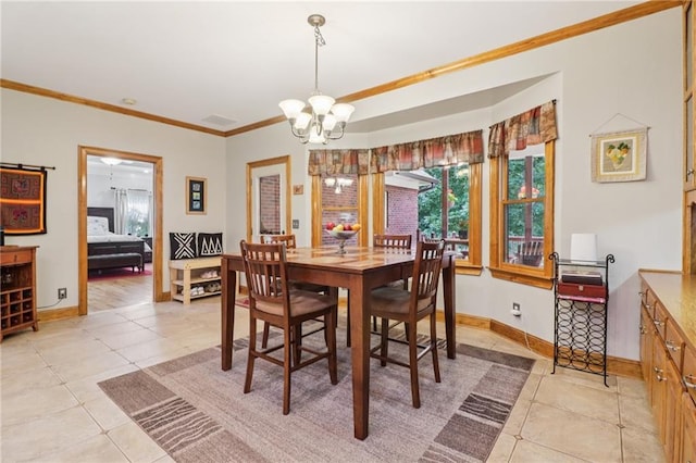 169 Robson Trl, Mcdonough, GA 30252 - dining space featuring light tile patterned flooring, a chandelier, and ornamental molding