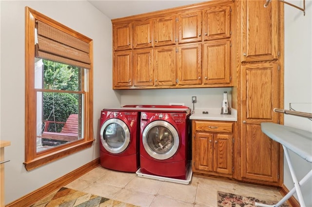 169 Robson Trl, Mcdonough, GA 30252 - laundry area featuring cabinet space and washing machine and dryer