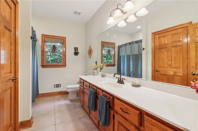 169 Robson Trl, Mcdonough, GA 30252 - full bathroom with vanity, tile patterned floors, a shower with curtain, and a chandelier