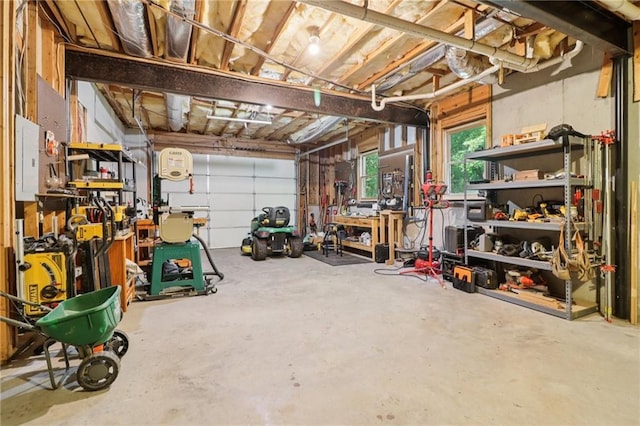 169 Robson Trl, Mcdonough, GA 30252 - garage with a workshop area and electric panel