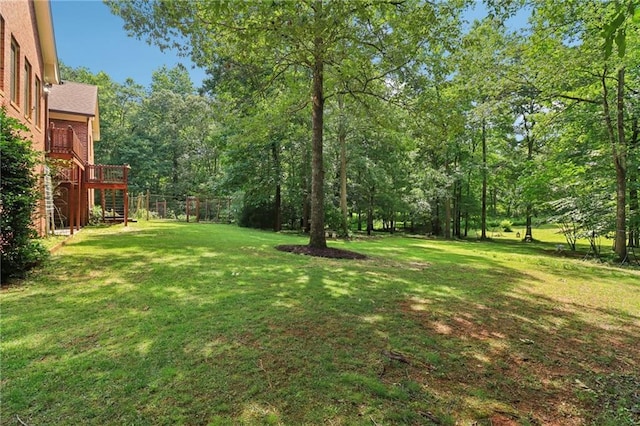 169 Robson Trl, Mcdonough, GA 30252 - view of green lawn featuring stairs and a deck