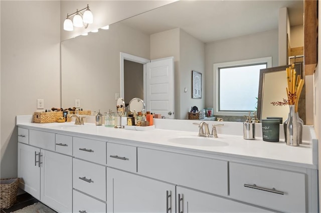 bathroom with double vanity and a sink