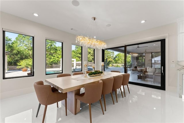 1336 Azalea Dr, Lawrenceville, GA 30043 - dining room with recessed lighting, a chandelier, baseboards, and light tile patterned floors