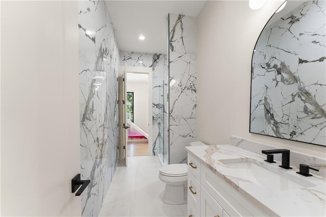 1336 Azalea Dr, Lawrenceville, GA 30043 - bathroom with toilet, vanity, ensuite bath, recessed lighting, and a marble finish shower