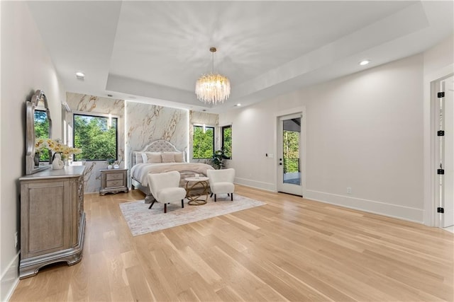 1336 Azalea Dr, Lawrenceville, GA 30043 - bedroom with access to outside, light wood-style flooring, a chandelier, baseboards, and recessed lighting