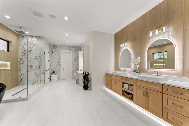 1336 Azalea Dr, Lawrenceville, GA 30043 - full bathroom featuring a marble finish shower, double vanity, recessed lighting, and tile walls