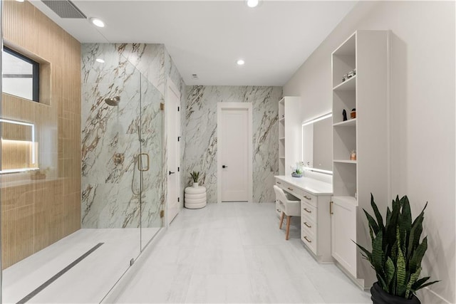 1336 Azalea Dr, Lawrenceville, GA 30043 - full bath featuring a marble finish shower, recessed lighting, and tile walls