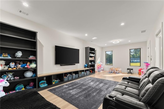 1336 Azalea Dr, Lawrenceville, GA 30043 - living area featuring wood finished floors and recessed lighting