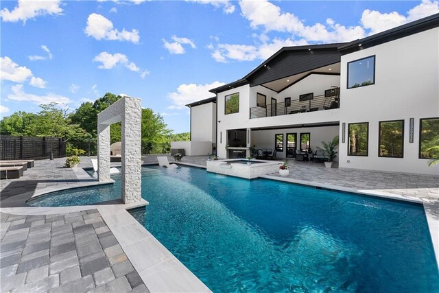 1336 Azalea Dr, Lawrenceville, GA 30043 - view of pool with an in-ground hot tub, a patio, a fenced backyard, and outdoor lounge area