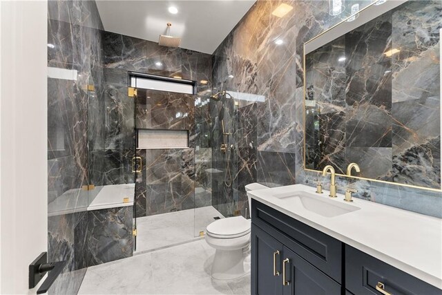 1336 Azalea Dr, Lawrenceville, GA 30043 - bathroom with tile walls, a marble finish shower, vanity, toilet, and marble tiled flooring