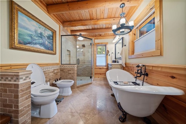 bathroom with beamed ceiling, a bidet, wood ceiling, independent shower and bath, and toilet