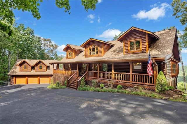 log home with a porch