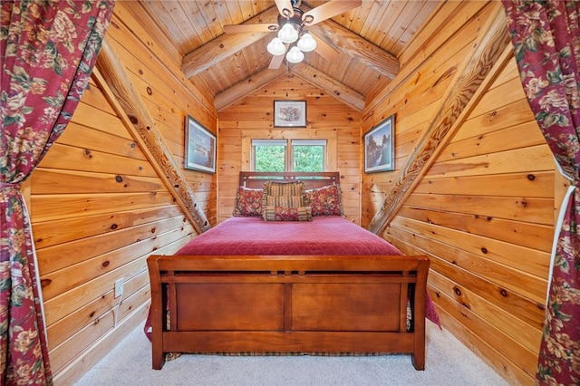 carpeted bedroom with lofted ceiling with beams, wooden walls, ceiling fan, and wooden ceiling