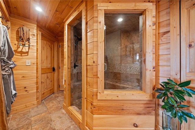 bathroom featuring wood ceiling and wood walls