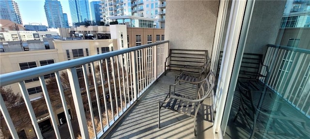 balcony featuring a view of city