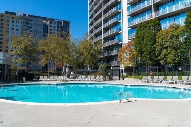 pool featuring fence