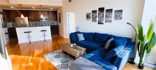 living area with light wood-style flooring