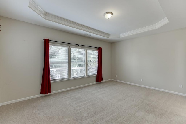 7719 Copper Kettle Way, Flowery Branch, GA 30542 - empty room with a tray ceiling, ornamental molding, and light colored carpet