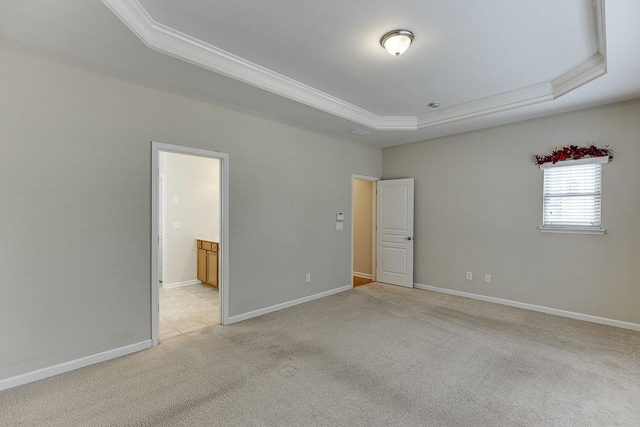 7719 Copper Kettle Way, Flowery Branch, GA 30542 - unfurnished bedroom with a raised ceiling, ornamental molding, and light carpet