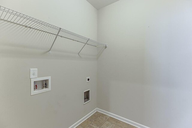 7719 Copper Kettle Way, Flowery Branch, GA 30542 - washroom with hookup for an electric dryer and washer hookup