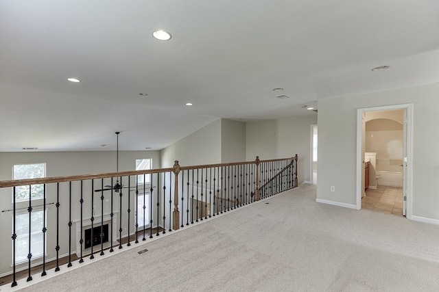 7719 Copper Kettle Way, Flowery Branch, GA 30542 - hall with carpet flooring, recessed lighting, and arched walkways