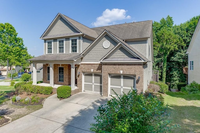 7719 Copper Kettle Way, Flowery Branch, GA 30542 - craftsman house with a porch, brick siding, concrete driveway, an attached garage, and a standing seam roof