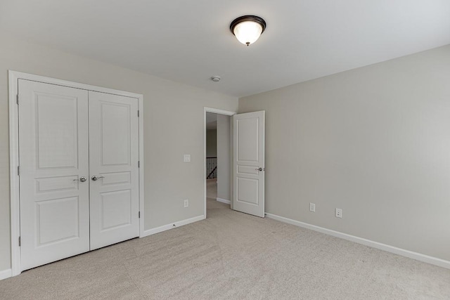 7719 Copper Kettle Way, Flowery Branch, GA 30542 - unfurnished bedroom featuring carpet floors and a closet