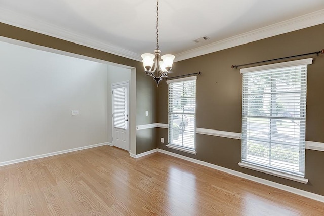 7719 Copper Kettle Way, Flowery Branch, GA 30542 - unfurnished room featuring a chandelier, light wood-style flooring, and crown molding
