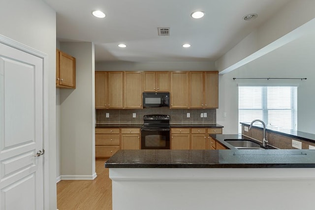 7719 Copper Kettle Way, Flowery Branch, GA 30542 - kitchen featuring black appliances, backsplash, light wood finished floors, light brown cabinetry, and recessed lighting