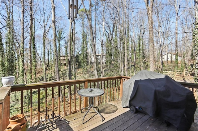 wooden terrace with grilling area