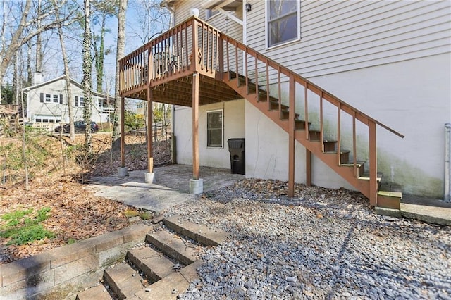 view of patio / terrace with stairs and a wooden deck