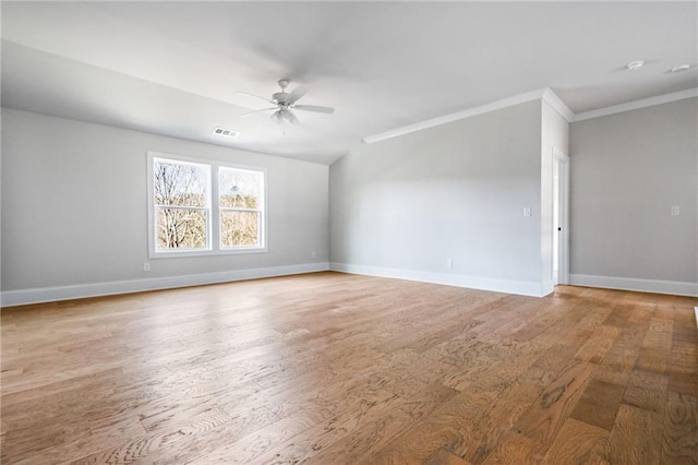 spare room with light wood-type flooring, ceiling fan, and ornamental molding