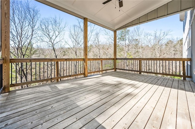 wooden terrace featuring ceiling fan