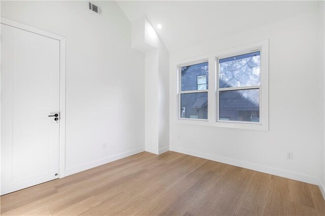 1247 Bridges Ave SW Unit B, Atlanta, GA 30310 - unfurnished room with light wood finished floors, baseboards, lofted ceiling, and recessed lighting