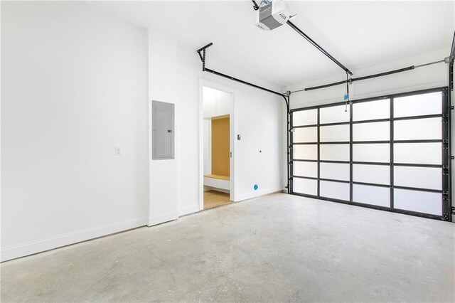 1247 Bridges Ave SW Unit B, Atlanta, GA 30310 - garage with electric panel, a garage door opener, and baseboards