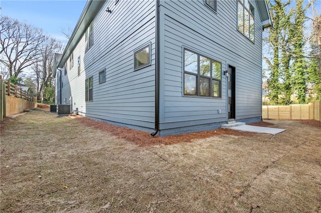 1247 Bridges Ave SW Unit B, Atlanta, GA 30310 - view of side of property with a fenced backyard and central air condition unit