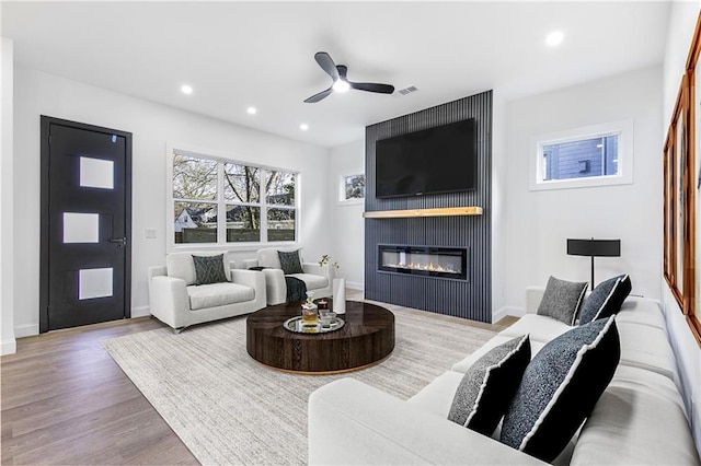 1247 Bridges Ave SW Unit B, Atlanta, GA 30310 - living area featuring wood finished floors, ceiling fan, recessed lighting, a large fireplace, and baseboards