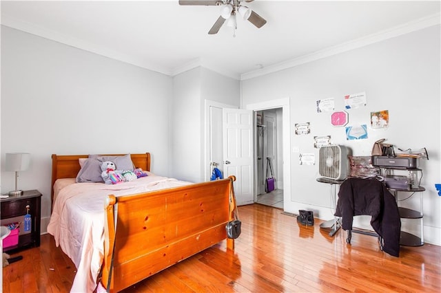 1091 Longley Ave NW, Atlanta, GA 30318 - bedroom featuring crown molding, a ceiling fan, and hardwood / wood-style floors